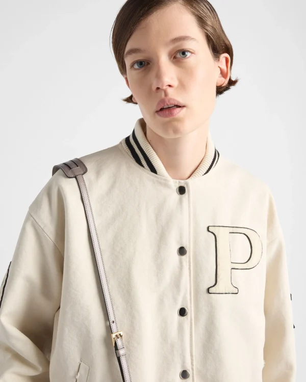 Outerwear*Prada Canvas bomber jacket with patches Ivory