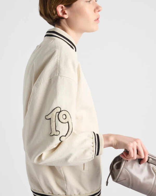 Outerwear*Prada Canvas bomber jacket with patches Ivory