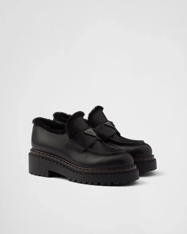 Loafers And Lace-ups*Prada Double Chocolate leather and shearling loafers Black