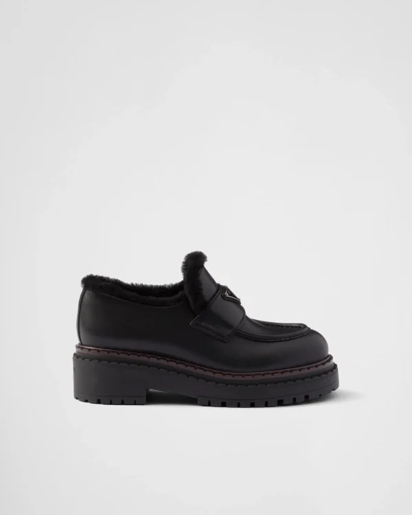 Loafers And Lace-ups*Prada Double Chocolate leather and shearling loafers Black