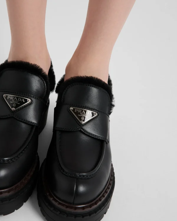 Loafers And Lace-ups*Prada Double Chocolate leather and shearling loafers Black