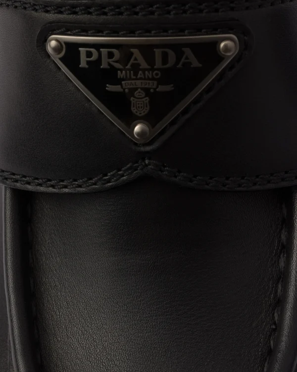 Loafers And Lace-ups*Prada Double Chocolate leather and shearling loafers Black