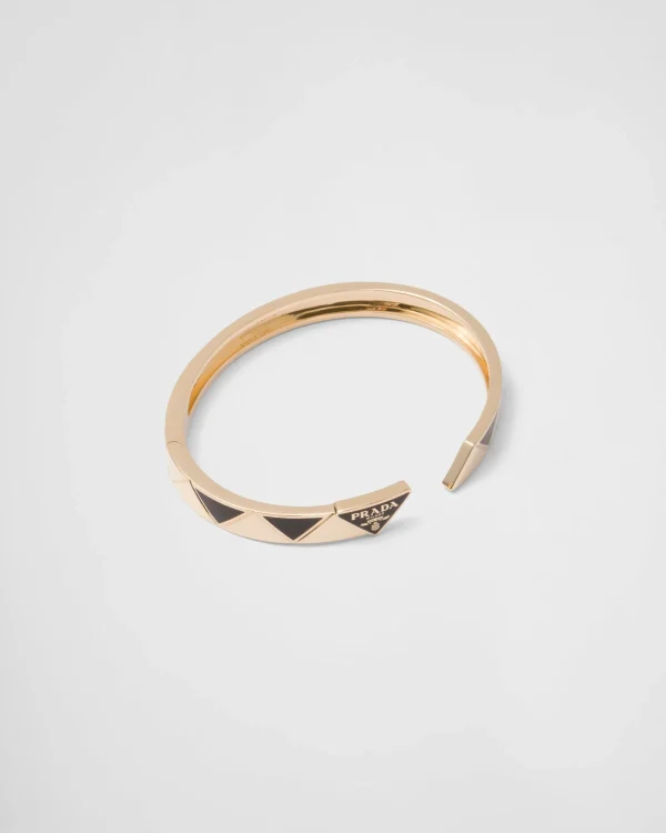 Bracelets*Prada Eternal Gold bangle bracelet in yellow gold with ceramic elements Gold/black