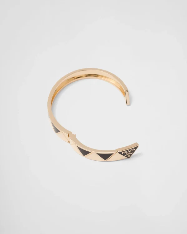 Bracelets*Prada Eternal Gold bangle bracelet in yellow gold with ceramic elements Gold/black