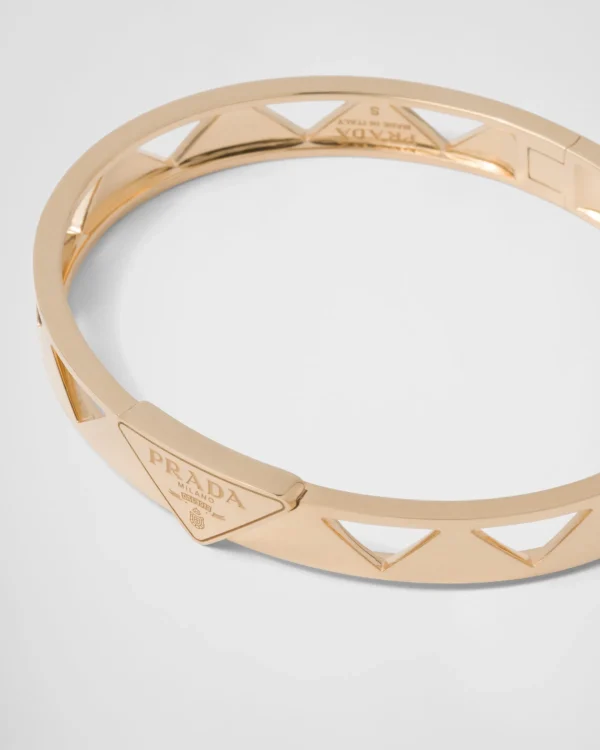 Bracelets*Prada Eternal cut-out bangle bracelet in yellow Gold