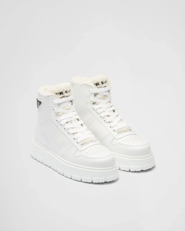 Sneakers*Prada Leather and shearling high-top sneakers White