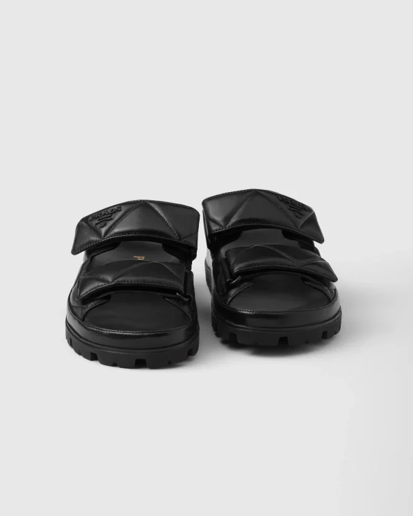 Slippers And Mules*Prada Padded nappa leather sandals Black