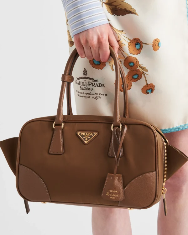 Top Handles | Top Handles*Prada Re-Edition 1978 medium Re-Nylon and Saffiano leather two-handle bag Corkbeige